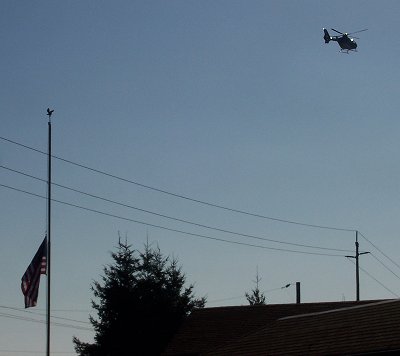 LifeFlight chopper and half-mast flag at Don Shirrell funeral