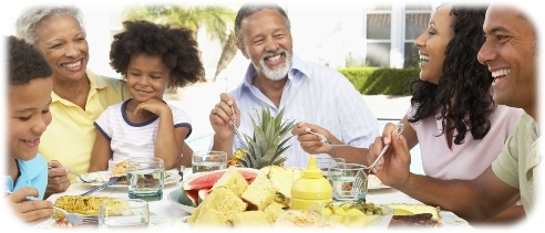 happy family with no electronic toys or mobile devices at mealtime