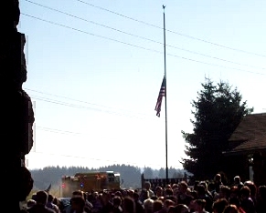 One of many fire trucks leaves Don's funeral